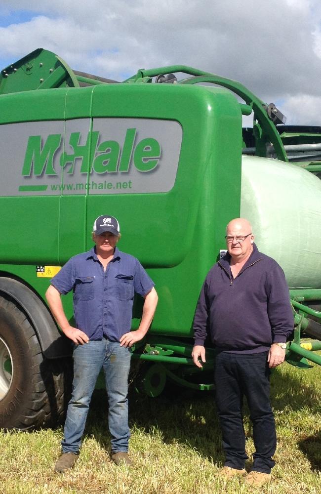 Darren Crawford, left, and Bertoli Farm Machinery’s Paul Watt with the McHale Fusion 3 variable-chamber baler wrapper.